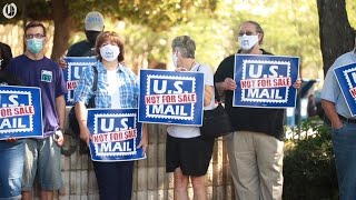 Post office workers protest after mail sorting machines were removed