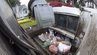 2014 Curbtender Packing Garbage