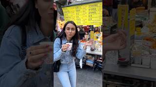 Korean street food is delicious 🥳❤️ sneaking off for a quick snack in Seoul 🇰🇷