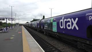 66099 with bogie biomass wagons at Barnetby on 24.8.21