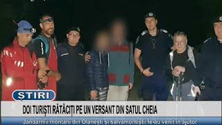 DOI TURISTI RATACITI PE UN VERSANT DIN SATUL CHEIA