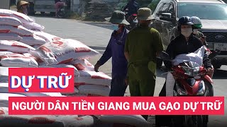 Gạo rớt giá, người dân Tiền Giang ùn ùn đi mua gạo về dự trữ