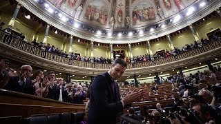 Spanish socialists win MPs' backing for left-wing coalition government, by just two votes