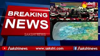 COVID-19 cases continue to surge across the US  | అమెరికాల మళ్ళీ కరోనా ఉగ్ర రూపం | Sakshi TV