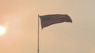 American flag stands strong amid California fires