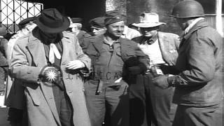 American newspapermen sprayed with delousing powder prior to inspection of the Na...HD Stock Footage