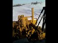 950g cat loader plowing snow in the bakken formation