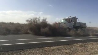 Snowplow removes tumbleweeds in Albuquerque, New Mexico