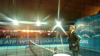 Mark Petchey hitting with coach. Boris Becker commentating