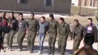 YPG and YPJ fighters dance after victory in Tal Maruf