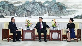 Xi and his wife meet senior DPRK official, watch art performance