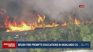 Large brush fire prompts evacuations in Highlands County