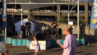 Youth group ZAHARA make the kids dance at #MakeMusicSeattle 2018 at the Seattle Waterfront