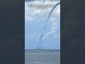 Boat flees enormous waterspout tornado in the Philippines