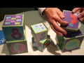 Unboxing a set of children's stacking cubes from the Unicef Shop