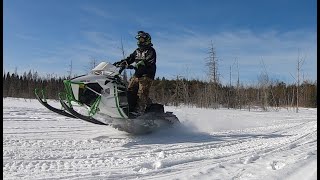 Snowmobiling Through a Saskatchewan Forest