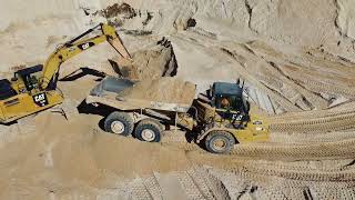 big excavator sand move cat 326 cat 725 pits boys