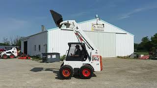 2002 BOBCAT 863G.    $27,900