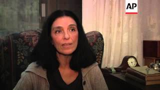 Memorial service at Golden Dawn office after shooting of party members, analyst comments