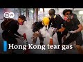 Hong Kong police fire tear gas at protesters | DW News