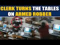 Heroic hotel clerk confronts an armed robber, video goes viral | OneIndia News