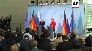 CHANCELLOR MERKEL AND PRESIDENT PUTIN COMMENT ON SYRIA