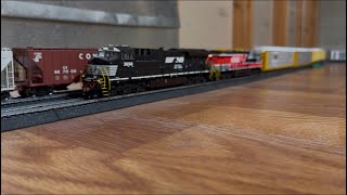 NS 33K lead by NS #3658 with NS #2022 (ScaleTrains Unit) trailing on the layout