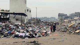 Garbage piles add to challenges as Gaza residents return home under truce