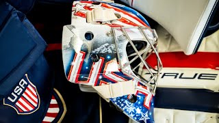 Swayman shows off his Team USA Mask