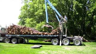 Unloading 10 cords of Tamarack