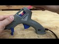 applying a glue gun to woodworking