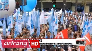 French labor unions strike against Macron's economic reforms