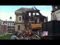 Crews demolish fire damaged Lewiston building