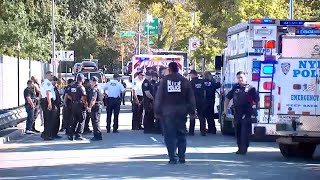 NYPD officer shot in the arm and leg in Queens; suspect in custody