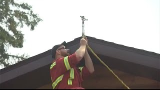 Fire crews put up temporary sprinkler systems to protect cottages at Caddy Lake