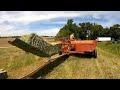 Bailing Hay with farmall M and New holland hayliner 269