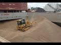 Cat® D3K2 and D5K2 Ship Hold/Port Handling Dozer | At Work