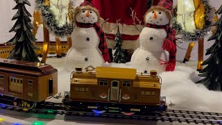 A CLASSIC TINPLATE TRAIN AT CHRISTMAS