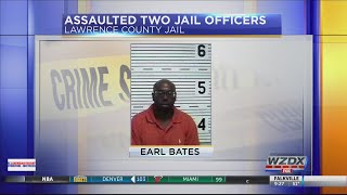Inmate assaults two jail officers