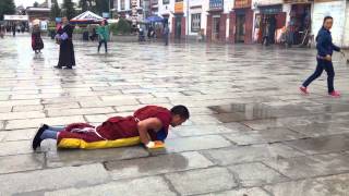 Tibetan Buddhist Monk Praying