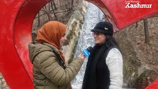 Tourists enjoying the pristine beauty of Ganderbal