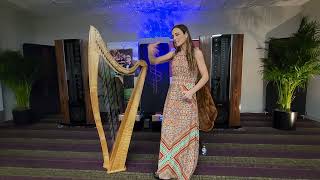 Live versus recorded - Beautiful Harp player in the Genesis Room