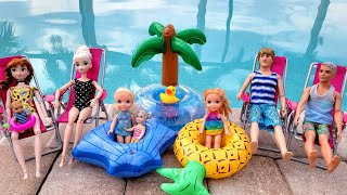 Family floaties day ! Elsa & Anna toddlers - Barbie dolls - gems - playing