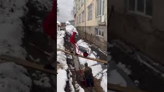 Winter thrills: daring wheelbarrow adventure in Dovge, Ukraine