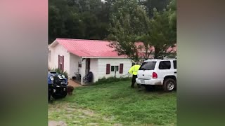 WATCH: Video shows flood waters carry Hickman County home down creek