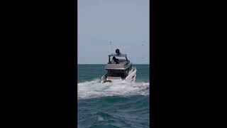 The Okean yacht and the Sunday drones at the Haulover Inlet