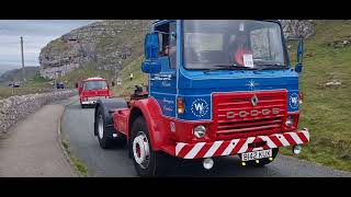 Cavalcade of old vehicles across the Great Orme in Llandudno