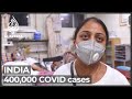 Indian states out of COVID vaccines as daily cases near 400,000