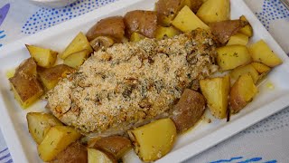 Baked swordfish steak with potatoes