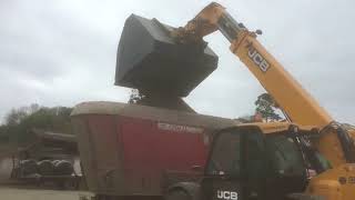 Everyday life on the farm. Padagas bulk material bucket on telehandler